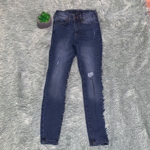 blue jeans (a couple rips) size 000
